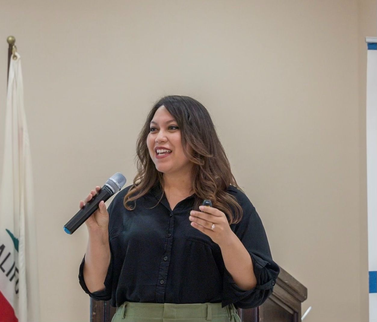 Victoria speaking at an event